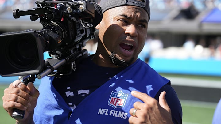Oct 29, 2023; Charlotte, North Carolina, USA; Former Panther and Ravens wide receiver Steve Smith Sr. tries his hand as a videographer during the first quarter between the Carolina Panthers and the Houston Texansat Bank of America Stadium. 