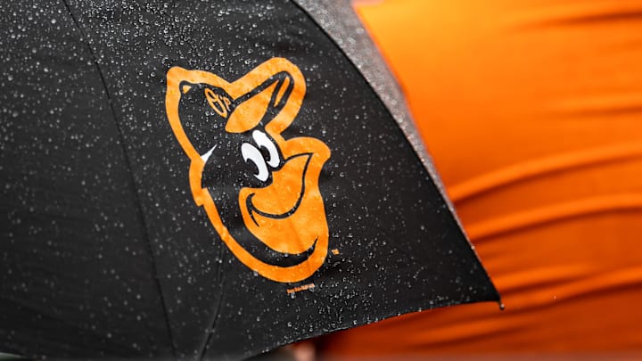 Aug 22, 2021; Baltimore, Maryland, USA; A Baltimore Orioles logo is seen on an umbrella during the game between the Baltimore Orioles and the Atlanta Braves at Oriole Park at Camden Yards. Mandatory Credit: Scott Taetsch-Imagn Images