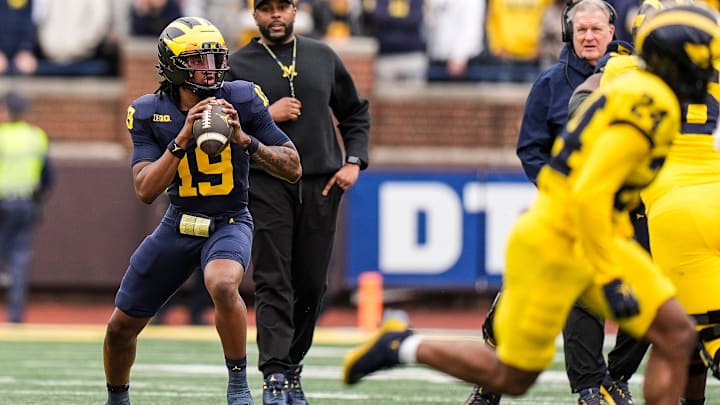 Michigan head coach Sherrone Moore watches quarterback Bryce Underwood (19) during the first half of the spring game at Michigan Stadium in Ann Arbor on Saturday, April 19, 2025.