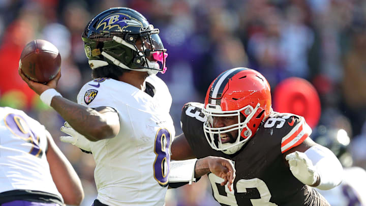 Cleveland Browns defensive tackle Shelby Harris (93) closes in on Baltimore Ravens quarterback Lamar Jackson (8) during the second half of an NFL football game at Huntington Bank Field, Sunday, Oct. 27, 2024, in Cleveland, Ohio.