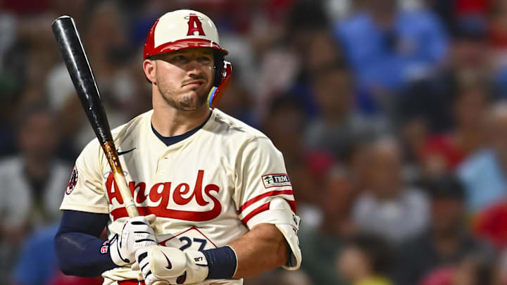 Aug 23, 2025; Anaheim, California, USA; Los Angeles Angels designated hitter Mike Trout (27) reacts after striking out against the Chicago Cubs during the sixth inning at Angel Stadium. Mandatory Credit: Jonathan Hui-Imagn Images