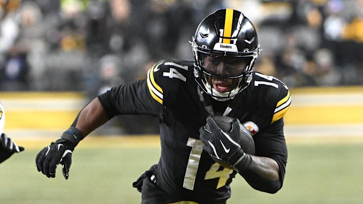 Jan 4, 2026; Pittsburgh, Pennsylvania, USA; Pittsburgh Steelers running back Kenneth Gainwell (14) runs  against the Baltimore Ravens during the first half at Acrisure Stadium. Mandatory Credit: Barry Reeger-Imagn Images