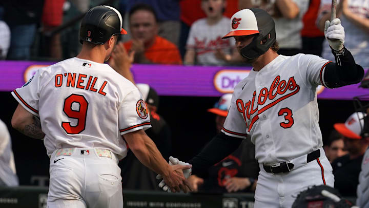 Mar 26, 2026; Baltimore, Maryland, USA; Baltimore Orioles outfielder Tyler O’Neil (9) greeted by second baseman Blaze Alexander (3) after scoring a run during the eighth inning against the Minnesota Twins at Oriole Park at Camden Yards. Mandatory Credit: Mitch Stringer-Imagn Images