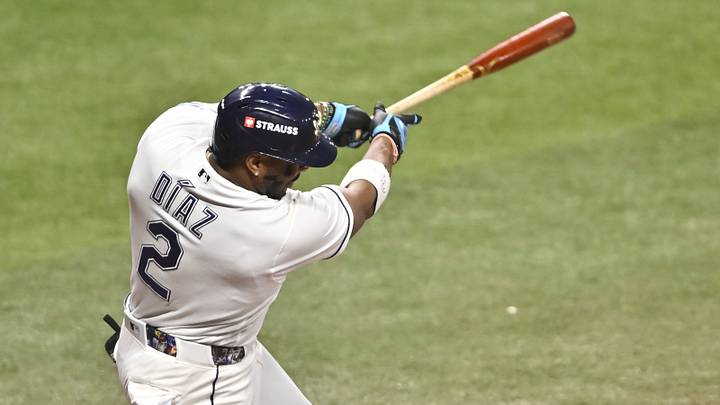 Oct 19, 2026; St. Petersburg, Florida, USA;  Tampa Bay Rays designated hitter Yandy Diaz (2) hits a two run home run during the eighth inning against the Cleveland Guardians in game six of the ALCS for the 2026 MLB Playoffs at Tropicana Field.  Mandatory Credit: Pablo Robles-Imagn Images
