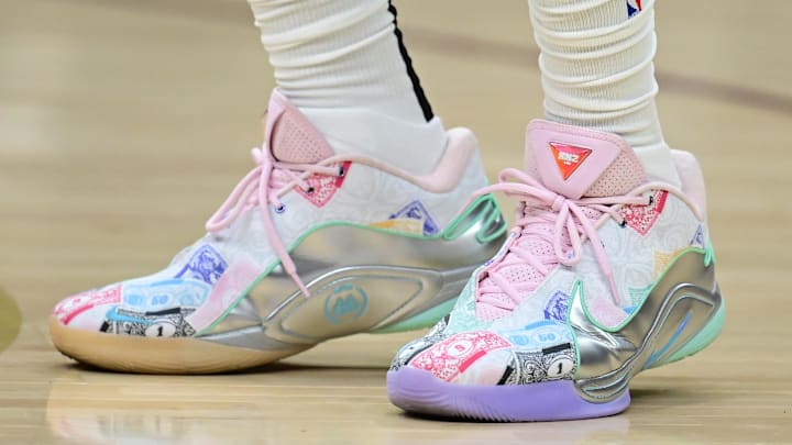 Los Angeles Lakers forward LeBron James wears the Nike LeBron 22 a Monopoly-inspired colorway.