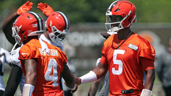 Browns quarterback Jameis Winston (5) celebrates a pass with Deshaun Watson (4) during minicamp, Tuesday, June 11, 2024, in Berea. Browns quarterback Jameis Winston (5) celebrates a pass with Deshaun Watson (4) during minicamp, Tuesday, June 11, 2024, in Berea.