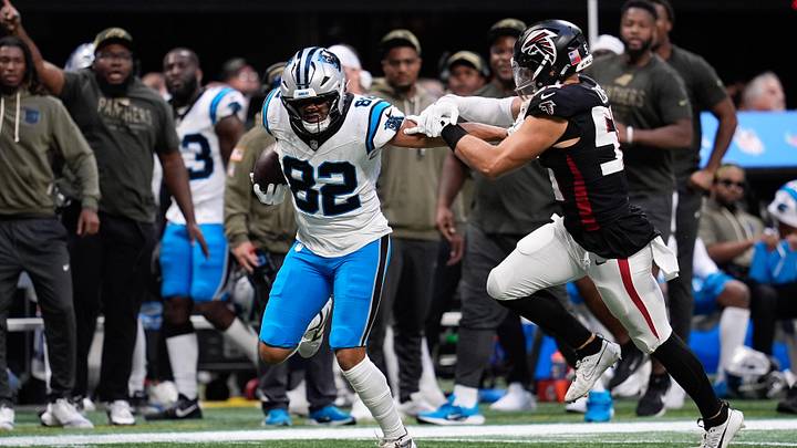 Carolina Panthers tight end Tommy Tremble (82) runs with the ball in the overtime Carolina Panthers tight end Tommy Tremble (82) runs with the ball in the overtime