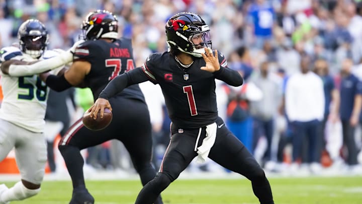 Dec 8, 2024; Glendale, Arizona, USA; Arizona Cardinals quarterback Kyler Murray (1) against the Seattle Seahawks at State Farm Stadium. Mandatory Credit: Mark J. Rebilas-Imagn Images