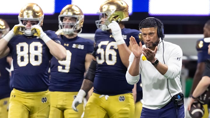 Jan 20, 2025; Atlanta, GA, USA; Notre Dame Fighting Irish head coach Marcus Freeman against the Ohio State Buckeyes during the CFP National Championship college football game at Mercedes-Benz Stadium. Mandatory Credit: Mark J. Rebilas-Imagn Images Jan 20, 2025; Atlanta, GA, USA; Notre Dame Fighting Irish head coach Marcus Freeman against the Ohio State Buckeyes during the CFP National Championship college football game at Mercedes-Benz Stadium. Mandatory Credit: Mark J. Rebilas-Imagn Images