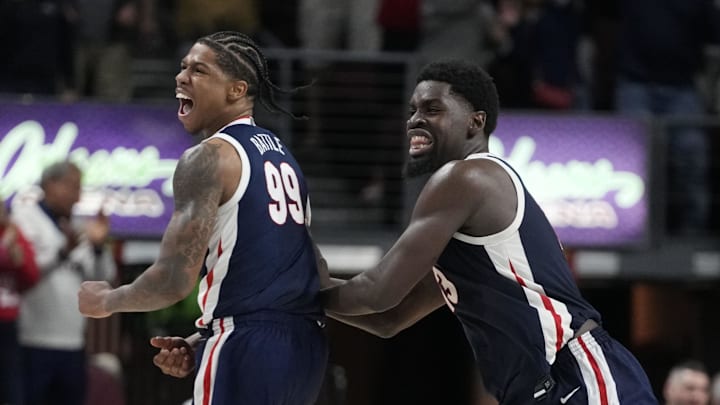 Gonzaga Bulldogs guard Khalif Battle (99) and forward Graham Ike (13). 