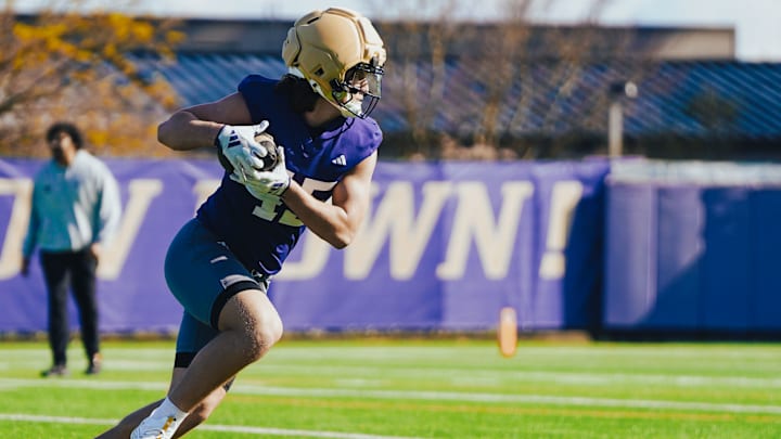 Austin Simmons heads upfield in ball on the East field. 