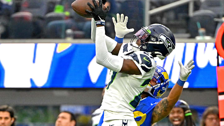 Dec 4, 2022; Inglewood, California, USA; Seattle Seahawks cornerback Tariq Woolen (27) reaches in front of Los Angeles Rams running back Kyren Williams (23) for an interception in the first half at SoFi Stadium. Mandatory Credit: Jayne Kamin-Oncea-Imagn Images Dec 4, 2022; Inglewood, California, USA; Seattle Seahawks cornerback Tariq Woolen (27) reaches in front of Los Angeles Rams running back Kyren Williams (23) for an interception in the first half at SoFi Stadium. Mandatory Credit: Jayne Kamin-Oncea-Imagn Images