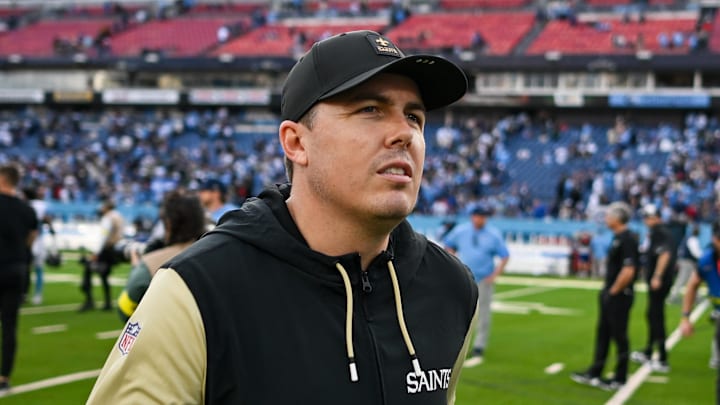 Dec 28, 2025; Nashville, Tennessee, USA;  New Orleans Saints head coach Kellen Moore leaves the field against the Tennessee Titans during the second half at Nissan Stadium. Mandatory Credit: Steve Roberts-Imagn Images