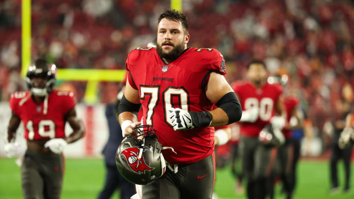 Jan 15, 2024; Tampa, Florida, USA; Tampa Bay Buccaneers center Robert Hainsey (70) runs during warm ups before a 2024 NFC wild card game against the Philadelphia Eagles at Raymond James Stadium. Mandatory Credit: Kim Klement Neitzel-USA TODAY Sports