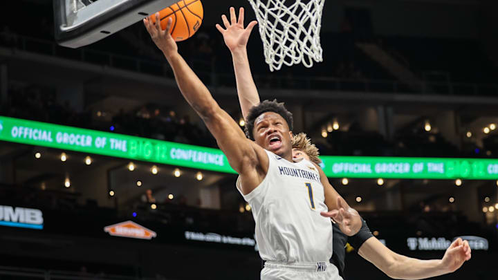 Mar 12, 2025; Kansas City, MO, USA; West Virginia Mountaineers guard Joseph Yesufu (1) shoots the ball during the first half against the Colorado Buffaloes at T-Mobile Center. Mandatory Credit: William Purnell-Imagn Images Mar 12, 2025; Kansas City, MO, USA; West Virginia Mountaineers guard Joseph Yesufu (1) shoots the ball during the first half against the Colorado Buffaloes at T-Mobile Center. Mandatory Credit: William Purnell-Imagn Images