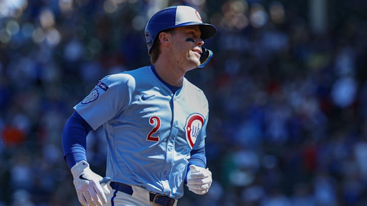 Sep 26, 2025; Chicago, Illinois, USA; Chicago Cubs second baseman Nico Hoerner (2) rounds the bases after hitting a solo home run against the St. Louis Cardinals during the first inning at Wrigley Field. Mandatory Credit: Kamil Krzaczynski-Imagn Images