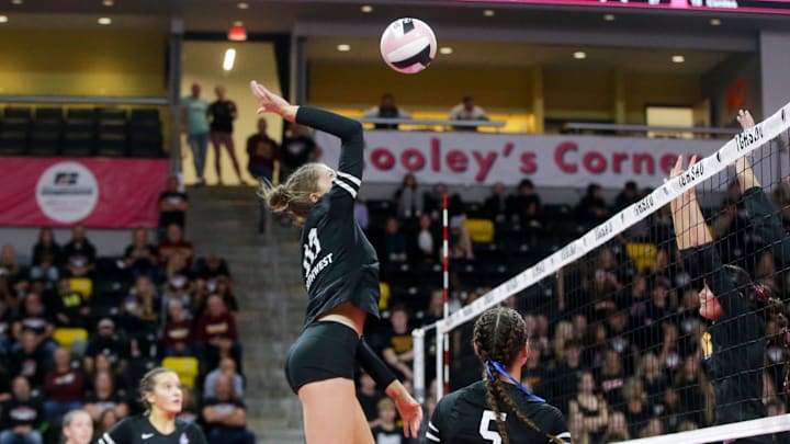 Waukee Northwest's Avery Cordes (10) attacks Ankeny during an IGHSAU state volleyball quarterfinals match Monday, Nov. 4, 2024 at Xtream Arena in Coralville, Iowa. Waukee Northwest's Avery Cordes (10) attacks Ankeny during an IGHSAU state volleyball quarterfinals match Monday, Nov. 4, 2024 at Xtream Arena in Coralville, Iowa.