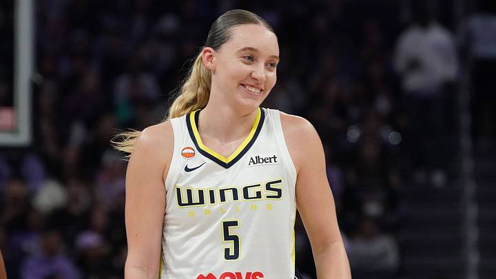 Aug 17, 2026; San Francisco, California, USA; Dallas Wings guard Paige Bueckers (5) smiles and waits for play to resume against the Golden State Valkyries in the third quarter at Chase Center. Mandatory Credit: David Gonzales-Imagn Images Aug 17, 2026; San Francisco, California, USA; Dallas Wings guard Paige Bueckers (5) smiles and waits for play to resume against the Golden State Valkyries in the third quarter at Chase Center. Mandatory Credit: David Gonzales-Imagn Images