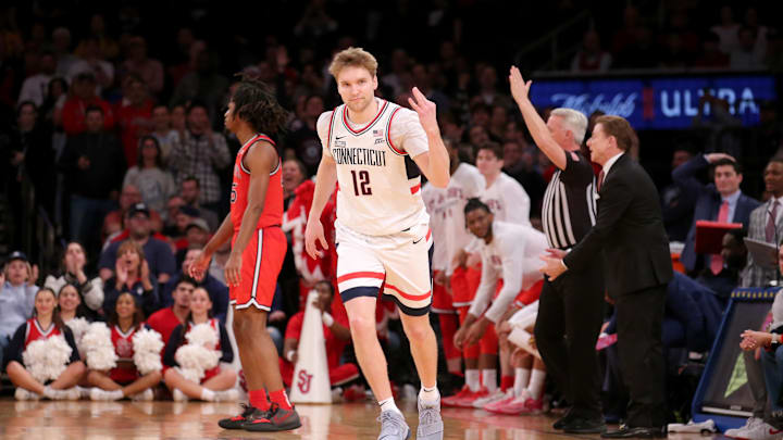 Mar 15, 2024; New York City, NY, USA; Connecticut Huskies guard Cam Spencer (12) celebrates his