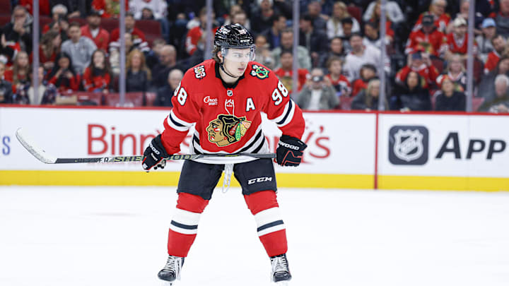Nov 18, 2025; Chicago, Illinois, USA; Chicago Blackhawks center Connor Bedard (98) looks on during the second period of an NHL game against the Calgary Flames at United Center. Mandatory Credit: Kamil Krzaczynski-Imagn Images Nov 18, 2025; Chicago, Illinois, USA; Chicago Blackhawks center Connor Bedard (98) looks on during the second period of an NHL game against the Calgary Flames at United Center. Mandatory Credit: Kamil Krzaczynski-Imagn Images