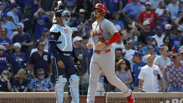 Aug 2, 2024; Chicago, Illinois, USA; St. Louis Cardinals third baseman Nolan Arenado (28) scores against the Chicago Cubs during the eighth inning at Wrigley Field. Mandatory Credit: Kamil Krzaczynski-Imagn Images Aug 2, 2024; Chicago, Illinois, USA; St. Louis Cardinals third baseman Nolan Arenado (28) scores against the Chicago Cubs during the eighth inning at Wrigley Field. Mandatory Credit: Kamil Krzaczynski-Imagn Images
