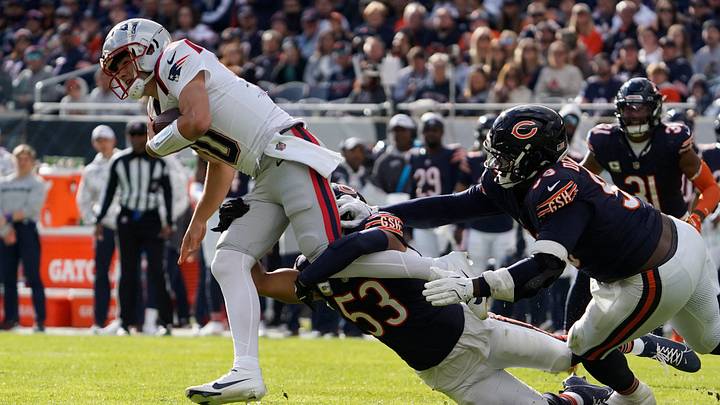 Nov 10, 2024; Chicago, Illinois, USA; Chicago Bears linebacker T.J. Edwards (53) tackles New England Patriots quarterback Drake Maye (10) during the first half at Soldier Field. Mandatory Credit: David Banks-Imagn Images Nov 10, 2024; Chicago, Illinois, USA; Chicago Bears linebacker T.J. Edwards (53) tackles New England Patriots quarterback Drake Maye (10) during the first half at Soldier Field. Mandatory Credit: David Banks-Imagn Images