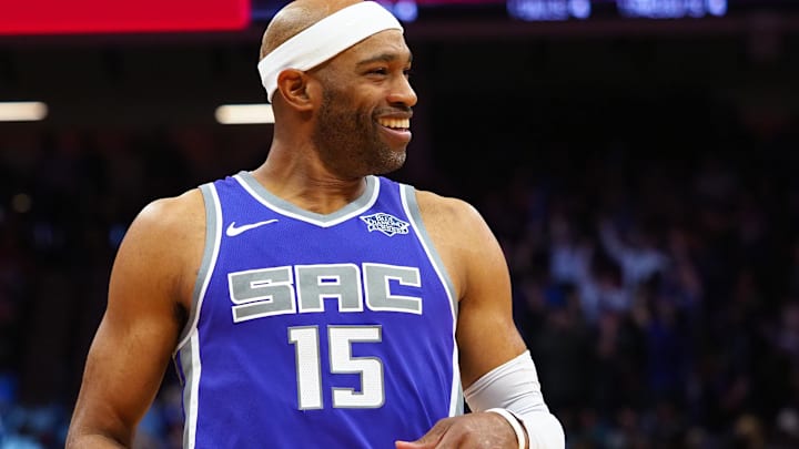 Apr 11, 2018; Sacramento, CA, USA; Sacramento Kings guard Vince Carter (15) smiles between plays against the Houston Rockets during the third quarter at Golden 1 Center. Mandatory Credit: Kelley L Cox-Imagn Images