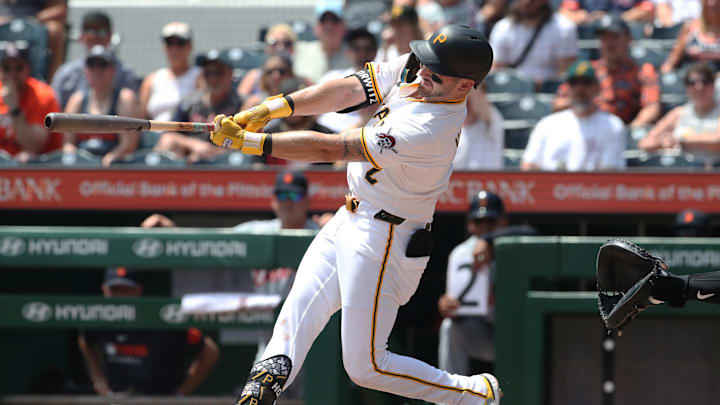Jul 23, 2025; Pittsburgh, Pennsylvania, USA;  Pittsburgh Pirates first baseman Spencer Horwitz (2) hits a grand slam home run against the Detroit Tigers during the second inning at PNC Park. Mandatory Credit: Charles LeClaire-Imagn Images
