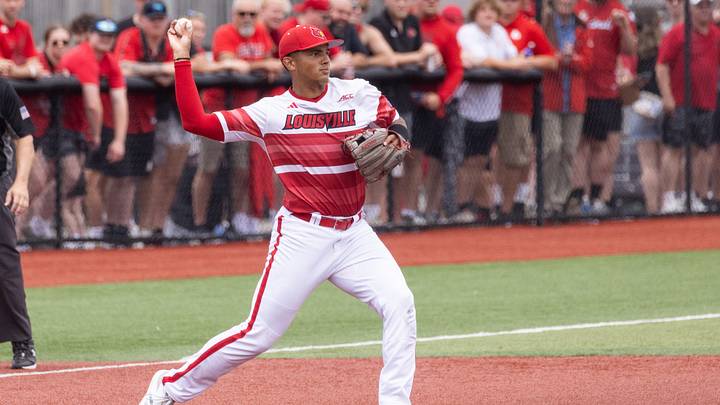 Louisville infielder Jake Munroe collects the hit and throws to second during the NCAA baseball Super Regional game 2 at Jim Patterson Stadium on June 7, 2025 in Louisville, Ky. Louisville infielder Jake Munroe collects the hit and throws to second during the NCAA baseball Super Regional game 2 at Jim Patterson Stadium on June 7, 2025 in Louisville, Ky.
