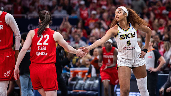 May 17, 2025; Indianapolis, Indiana, USA; Indiana Fever guard Caitlin Clark (22) and Chicago Sky forward Angel Reese (5) shake hands before the game at Gainbridge Fieldhouse. Mandatory Credit: Trevor Ruszkowski-Imagn Images May 17, 2025; Indianapolis, Indiana, USA; Indiana Fever guard Caitlin Clark (22) and Chicago Sky forward Angel Reese (5) shake hands before the game at Gainbridge Fieldhouse. Mandatory Credit: Trevor Ruszkowski-Imagn Images