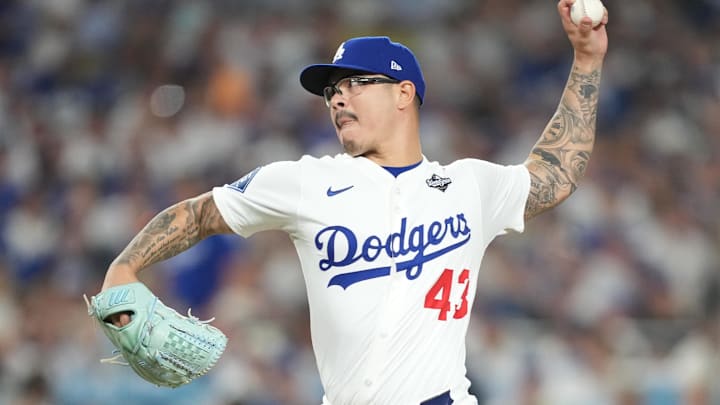 Oct 28, 2025; Los Angeles, California, USA; Los Angeles Dodgers pitcher Anthony Banda (43) pitches against the Toronto Blue Jays in the seventh inning during game four of the 2025 MLB World Series at Dodger Stadium. Mandatory Credit: Kirby Lee-Imagn Images