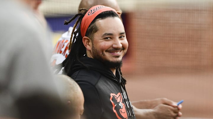 Jul 7, 2021; Baltimore, Maryland, USA;  Baltimore Orioles infielder Freddy Galvis stands in the dugout during the game against the Toronto Blue Jays at Oriole Park at Camden Yards. 