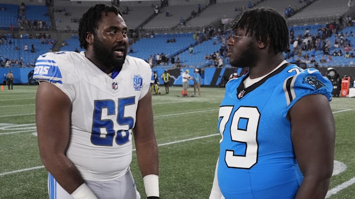 Aug 25, 2023; Charlotte, North Carolina, USA; Detroit Lions offensive tackle Obinna Eze (65) and Carolina Panthers offensive tackle Ikem Ekwonu (79) after the game at Bank of America Stadium. Mandatory Credit: Bob Donnan-Imagn Images Aug 25, 2023; Charlotte, North Carolina, USA; Detroit Lions offensive tackle Obinna Eze (65) and Carolina Panthers offensive tackle Ikem Ekwonu (79) after the game at Bank of America Stadium. Mandatory Credit: Bob Donnan-Imagn Images