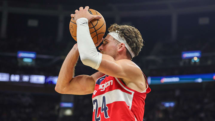 Nov 10, 2024; Orlando, Florida, USA; Washington Wizards forward Corey Kispert (24) shoots the ball during the second quarter against the Orlando Magic at Kia Center.