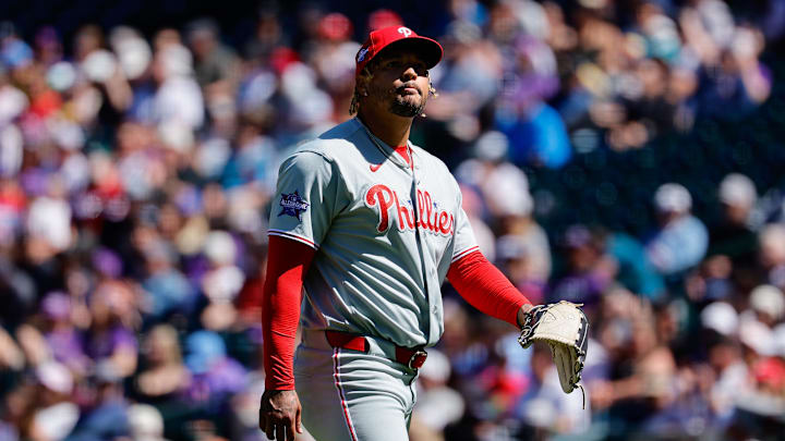 Apr 5, 2026; Denver, Colorado, USA; Philadelphia Phillies pitcher Taijuan Walker (99) walks the dugout at the end of the first inning against the Colorado Rockies at Coors Field. Mandatory Credit: Isaiah J. Downing-Imagn Images