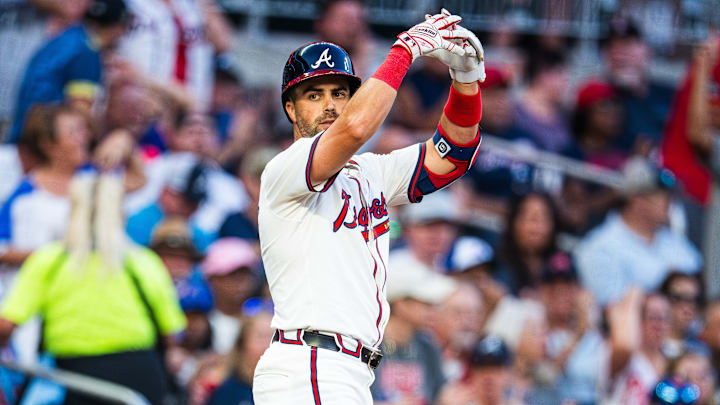 Former Philadelphia Phillies utilityman Whit Merrifield helped his new team, the Atlanta Braves, secure the win on Tuesday