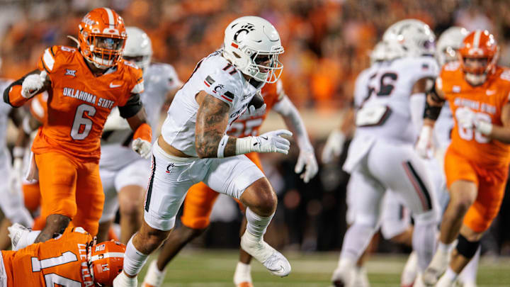 Oct 18, 2025; Stillwater, Oklahoma, USA; Cincinnati Bearcats tight end Joe Royer (11) runs the ball during the second half against the Oklahoma State Cowboys at Boone Pickens Stadium. Mandatory Credit: William Purnell-Imagn Images