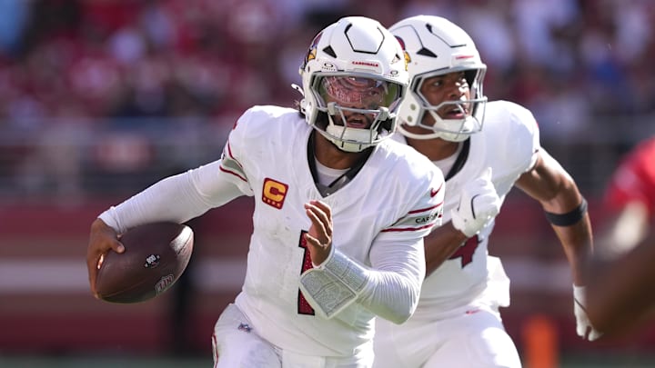 Oct 6, 2024; Santa Clara, California, USA; Arizona Cardinals quarterback Kyler Murray (center) carries the ball against the San Francisco 49ers during the fourth quarter at Levi's Stadium. Mandatory Credit: Darren Yamashita-Imagn Images Oct 6, 2024; Santa Clara, California, USA; Arizona Cardinals quarterback Kyler Murray (center) carries the ball against the San Francisco 49ers during the fourth quarter at Levi's Stadium. Mandatory Credit: Darren Yamashita-Imagn Images