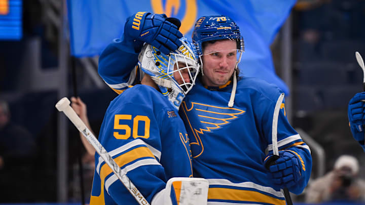 Apr 14, 2026; St. Louis, Missouri, USA; St. Louis Blues center Oskar Sundqvist (70) congratulates goaltender Jordan Binnington (50) after defeating the Pittsburgh Penguins at Enterprise Center. Mandatory Credit: Connor Hamilton-Imagn Images Apr 14, 2026; St. Louis, Missouri, USA; St. Louis Blues center Oskar Sundqvist (70) congratulates goaltender Jordan Binnington (50) after defeating the Pittsburgh Penguins at Enterprise Center. Mandatory Credit: Connor Hamilton-Imagn Images