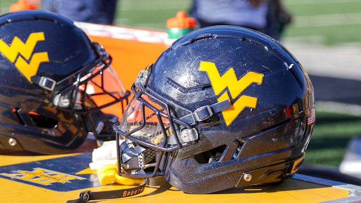 Aug 30, 2025; Morgantown, West Virginia, USA; A West Virginia Mountaineers football helmet is seen along the sidelines during the fourth quarter against the Robert Morris Colonials at Milan Puskar Stadium. Mandatory Credit: Ben Queen-Imagn Images Aug 30, 2025; Morgantown, West Virginia, USA; A West Virginia Mountaineers football helmet is seen along the sidelines during the fourth quarter against the Robert Morris Colonials at Milan Puskar Stadium. Mandatory Credit: Ben Queen-Imagn Images