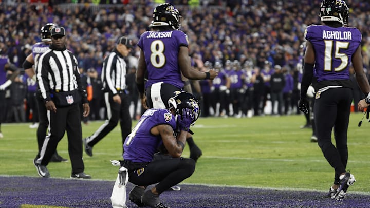 Jan 28, 2024; Baltimore, Maryland, USA; Baltimore Ravens wide receiver Zay Flowers (4) reacts in the end zone after a fumble against the Kansas City Chiefs during the second half in the AFC Championship football game at M&T Bank Stadium. Mandatory Credit: Geoff Burke-Imagn Images