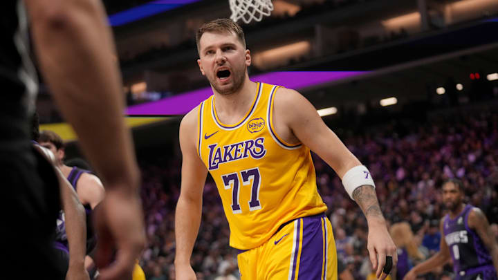 Jan 12, 2026; Sacramento, California, USA; Los Angeles Lakers guard Luka Doncic (77) reacts after committing a turnover against the Sacramento Kings in the second quarter at the Golden 1 Center. 