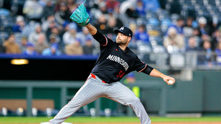 Apr 8, 2025; Kansas City, Missouri, USA; Minnesota Twins pitcher Danny Coulombe (54) pitches during the seventh inning against the Kansas City Royals at Kauffman Stadium. Mandatory Credit: William Purnell-Imagn Images