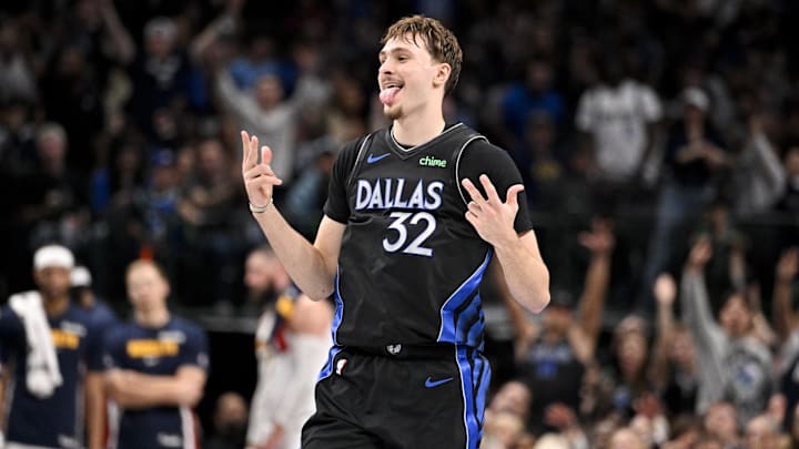 Dec 23, 2025; Dallas, Texas, USA; Dallas Mavericks forward Cooper Flagg (32) celebrates a three point basket during the second half against the Denver Nuggets at the American Airlines Center. Mandatory Credit: Jerome Miron-Imagn Images