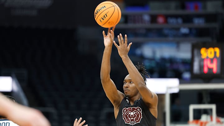 Missouri State junior Chance Moore (0) puts up a shot during a Missouri Valley Conference Tournament game between Missouri State and Murray State, Thursday, March 7, 2024, at Enterprise Center in St. Louis.