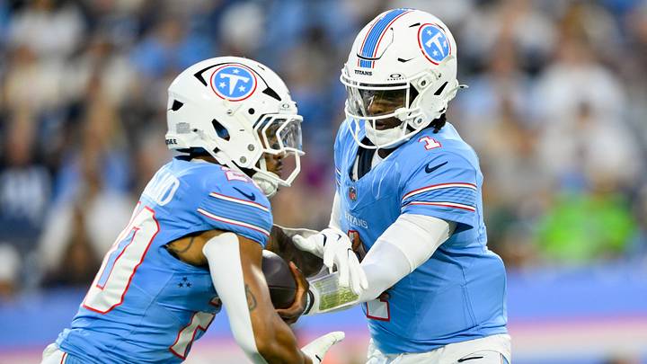 Aug 23, 2026; Nashville, Tennessee, USA; Tennessee Titans quarterback Cam Ward (1) hands the ball off to running back Tony Pollard (20) against the Seattle Seahawks during the first half at Nissan Stadium. Mandatory Credit: Steve Roberts-Imagn Images Aug 23, 2026; Nashville, Tennessee, USA; Tennessee Titans quarterback Cam Ward (1) hands the ball off to running back Tony Pollard (20) against the Seattle Seahawks during the first half at Nissan Stadium. Mandatory Credit: Steve Roberts-Imagn Images