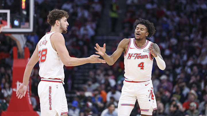 Jan 6, 2024; Houston, Texas, USA; Houston Rockets guard Jalen Green (4) celebrate with center Alperen Sengun (28) after a play during the second quarter against the Milwaukee Bucks at Toyota Center. Mandatory Credit: Troy Taormina-Imagn Images