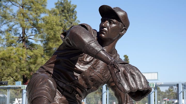 Apr 29, 2025; Los Angeles, California, USA; A statue of former Los Angeles Dodgers pitcher Sandy Koufax at Dodger Stadium. Mandatory Credit: Kirby Lee-Imagn Images