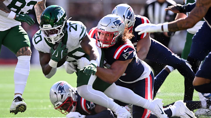 Oct 27, 2024; Foxborough, Massachusetts, USA; New England Patriots wide receiver Kendrick Bourne (84) tackles New York Jets running back Breece Hall (20) during the first half at Gillette Stadium. Mandatory Credit: Brian Fluharty-Imagn Images