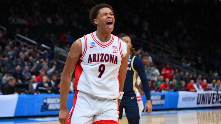 Mar 21, 2025; Seattle, WA, USA; Arizona Wildcats forward Carter Bryant (9) reacts after dunking the ball against the Akron Zips during the first half in the first round of the NCAA Tournament at Climate Pledge Arena. Mar 21, 2025; Seattle, WA, USA; Arizona Wildcats forward Carter Bryant (9) reacts after dunking the ball against the Akron Zips during the first half in the first round of the NCAA Tournament at Climate Pledge Arena.